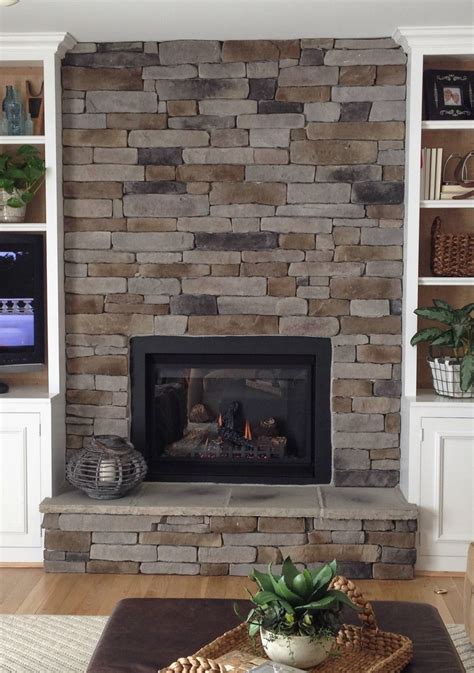 Stacked Stone Tile Fireplace | Stone veneer fireplace, Stacked stone fireplaces, Stone veneer wall