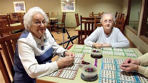 Seniors enjoying bingo at Huffman Place - YouTube