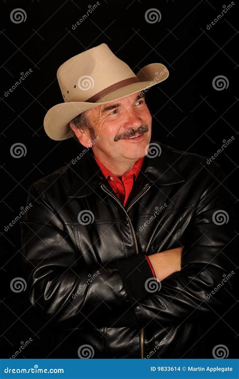 Man wearing cowboy hat stock photo. Image of grin, attractive - 9833614