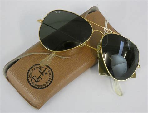 Ray Ban by Bausch & Lomb, a pair of vintage Aviator sunglasses, with RB ...