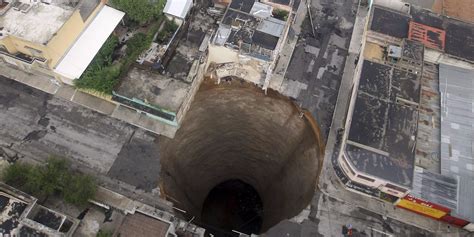 How sinkholes form, why they open up on roads and swallow cars - Business Insider