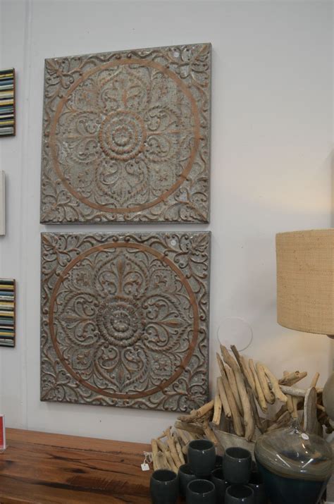 Heavy metal! Pressed tin wall art creates bohemian style to your room ...