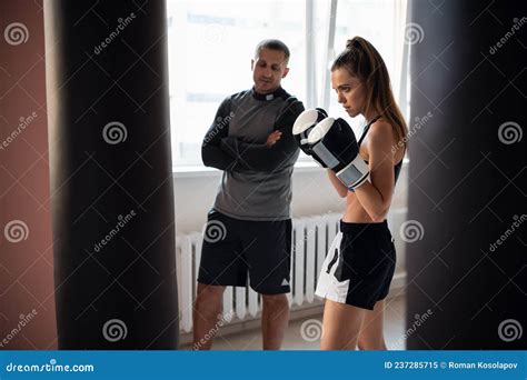 Woman Training Boxing with Personal Trainer. Instructor Teaching Female ...