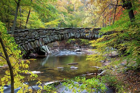 Old Stone Bridge Over Stream by Beklaus