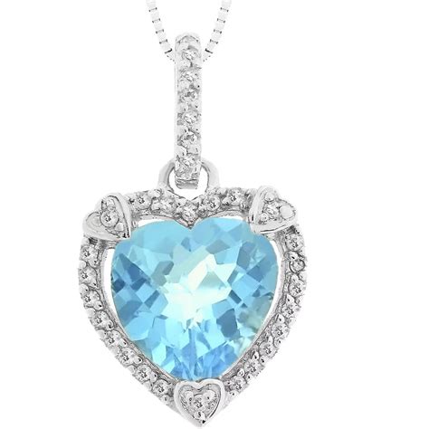 Sterling Silver Blue Topaz Birthstone Pendant With Diamond Accents ...