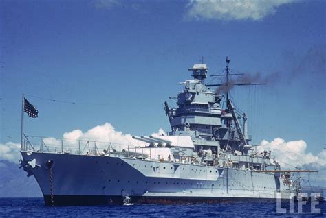 Full color photo of USS Idaho during Pacific Fleet exercises in 1940, she is seen at anchor off ...