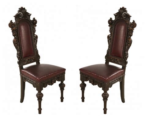 Set of italian renaissance style walnut and leather high back dining side chairs