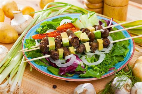 Chicken Hearts Skewers with Avocado Stock Photo - Image of liver, leaf ...