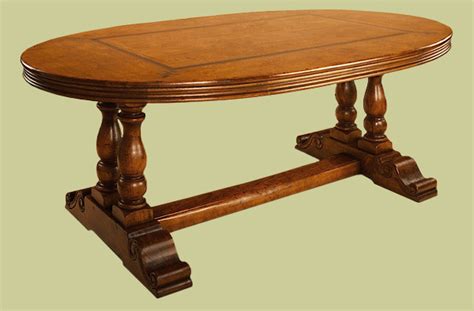Oak Oval Dining Table on Hand Carved Paired Pedestal Bases