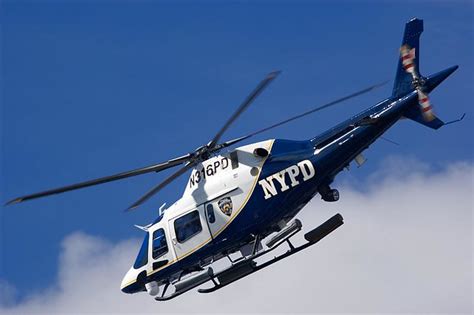 NYPD Helicopter | NYPD Helicopter close to the top of the Em… | Flickr