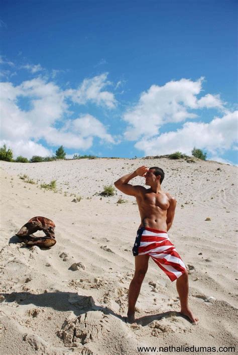 Male model at the beach with US flag draped around his waist | America, Shoot inspiration, Male ...