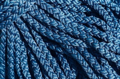 Premium Photo | Close-up of the texture of a thick blue rope.