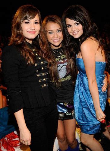 friends together - Miley Cyrus vs. Selena Gomez Photo (15224738) - Fanpop