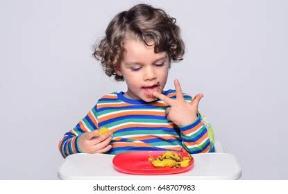 Kid Getting Messy While Eating Chocolate Stock Photo 589996475 ...