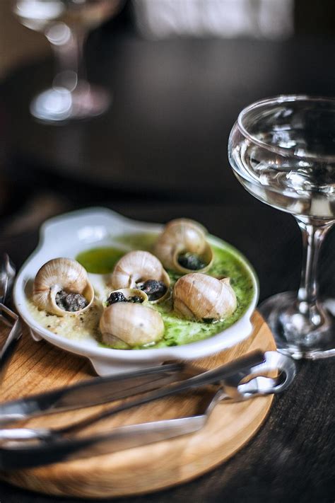 Appetizing escargots dish served in restaurant · Free Stock Photo