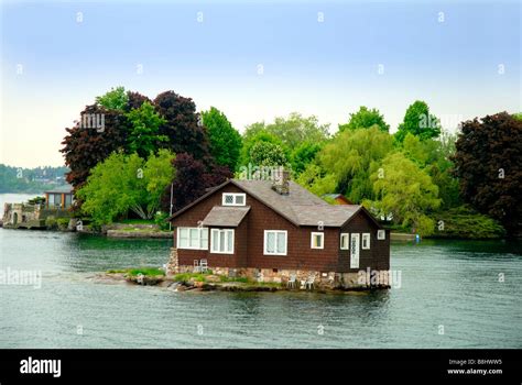 The 1000 Islands Cruise on the St Lawrence River which borders Canada Stock Photo, Royalty Free ...