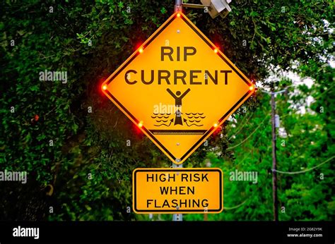 Flashing rip current sign hi-res stock photography and images - Alamy