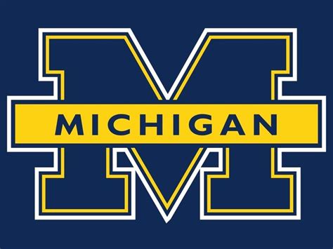 the michigan wolverines logo is shown in blue and yellow with white ...