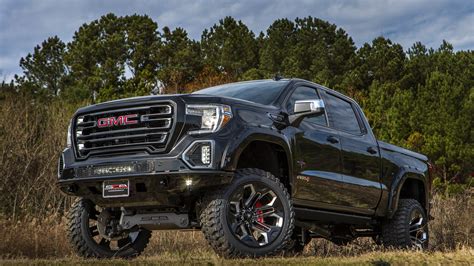 GMC BLACK WIDOW LIFTED TRUCKS — SCA Performance | Black Widow Lifted Trucks