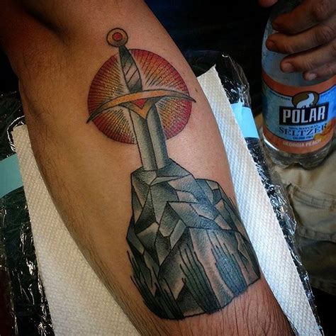 Sword in stone tattoo by Krystal Ingram. #krystalingram #tattoos # ...