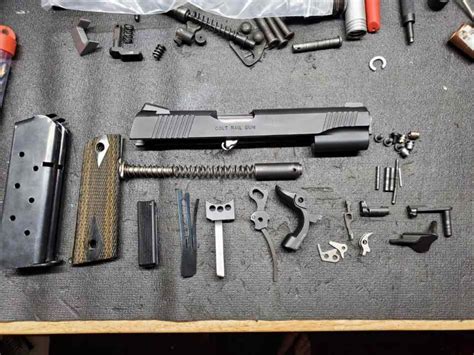 Colt Rail Gun Parts Kit everything minus frame. : Pistols