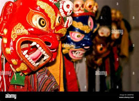 wooden masks for ritual dances in buddhist monasteries Stock Photo - Alamy