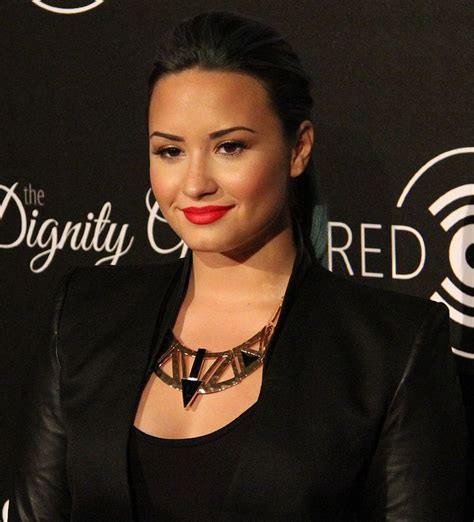 Demi Lovato Height, Weight, Body Measurements, Eye Color, Hair Color