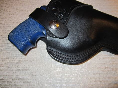 ITEM # 856 - Taurus 85 38 special and taurus small frame 2" to 2 1/2"barrel revolver holster