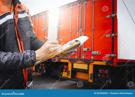 Truck Drivers Hold a Clipboard the Checking Container Door. Cargo Shipping. Load Trucks ...