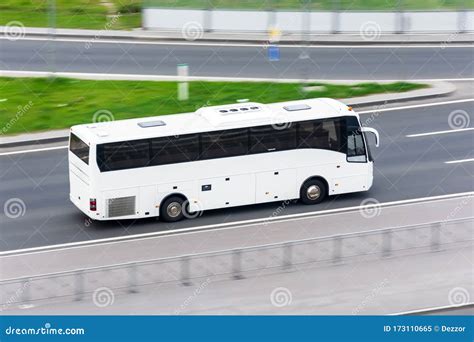 Big White Tour Bus Traveling on Road Trip Stock Image - Image of ...