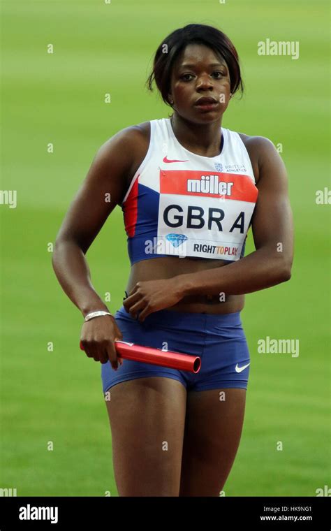 Asha Philip of Great Britain runs the first leg in the womens 4x100m ...