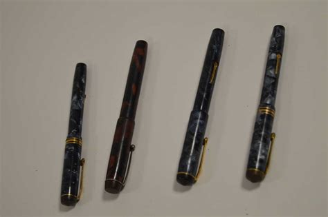 Lot 660 - Four Conway Stewart fountain pens