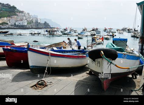 Fishing boats in Amalfi harbour, Italy Stock Photo - Alamy