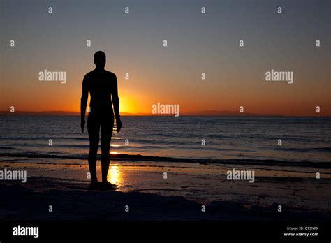 Another Place at sunset Stock Photo - Alamy