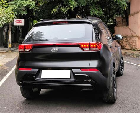 Kia Sonet Modified In Bangalore: Custom Black Wrapped SUV With Black Grille, 16-Inch Black GTR ...