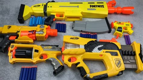 Yellow Nerf Guns Box of Toy Guns Dart Blasters - YouTube