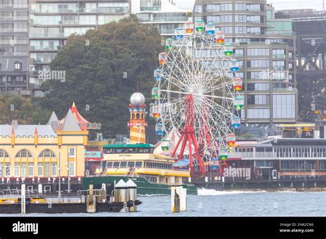 Luna Park amusement park in North Sydney with ferry May Gibbs approaching Mcmahons point ferry ...