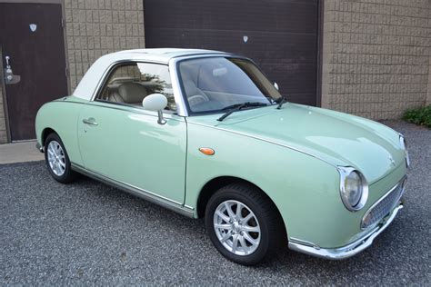 Figaro - Nissan Figaro next up for Sotheby's online auction : Luciano pavarotti — figaro 04:42.