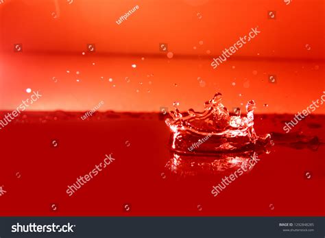 Red Water Splash Background Stock Photo 1292848285 | Shutterstock