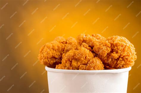 Premium Photo | Crispy fried chicken in the bucket chicken bucket