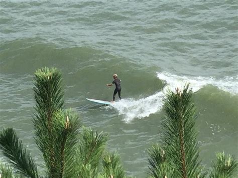 Surfer in Montauk Photograph by David Zuhusky - Fine Art America