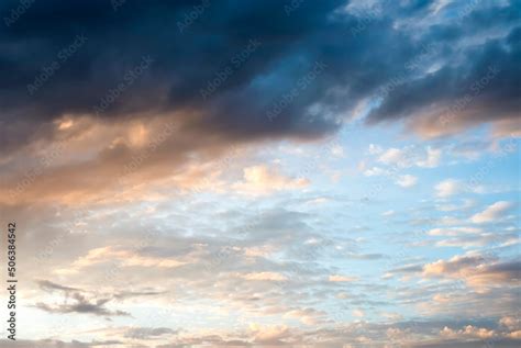 Blue sky with clouds at sunset Stock Photo | Adobe Stock