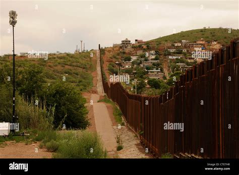 The border wall divides Nogales, Arizona, USA, (left), and Nogales ...