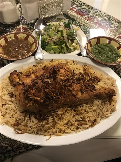 [I ate] Chicken Mandi, a Yemeni dish with spice flavored rice, topped with slow cooked chicken ...