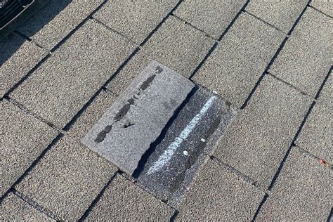 How do I know if I have wind damaged shingles?