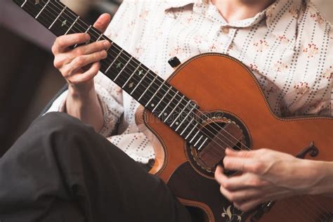 Acoustic guitar player stock photo. Image of electric - 153460312