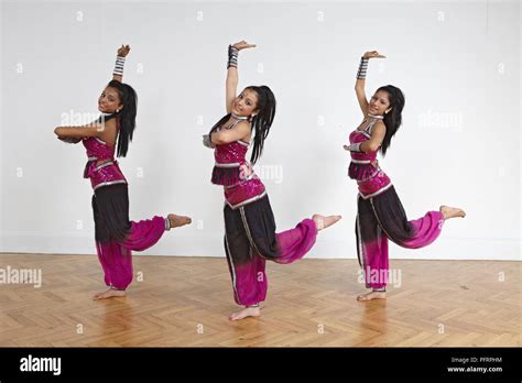 Three teenage girls performing Bollywood dance moves (formation Stock Photo - Alamy