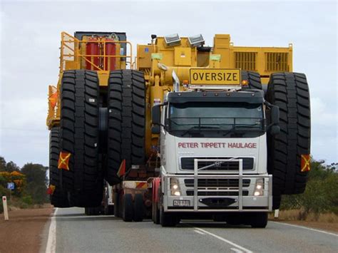 How do These Giant Trucks and Their Tires Get Ferried Around? | Furious.one