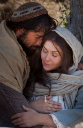 Mary and Joseph Rest while on Their Journey to Bethlehem