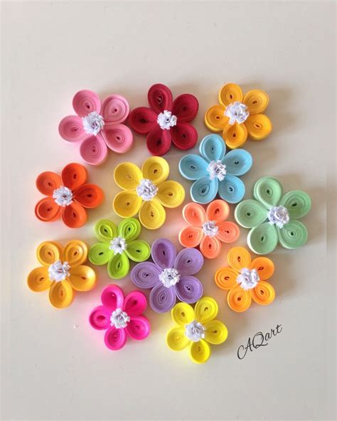 Mini flowers | Paper quilling designs, Quilling flower designs, Diy quilling crafts